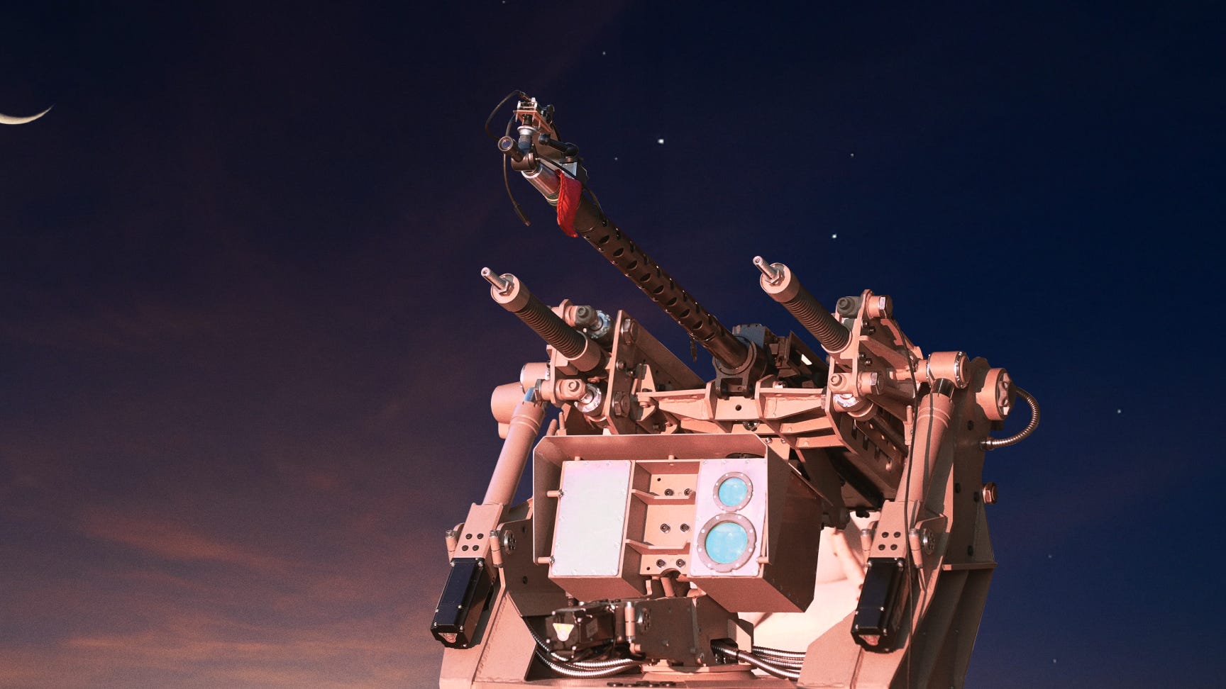 A turret-shaped weapon with a machine gun on top in front of a night sky with the moon behind it