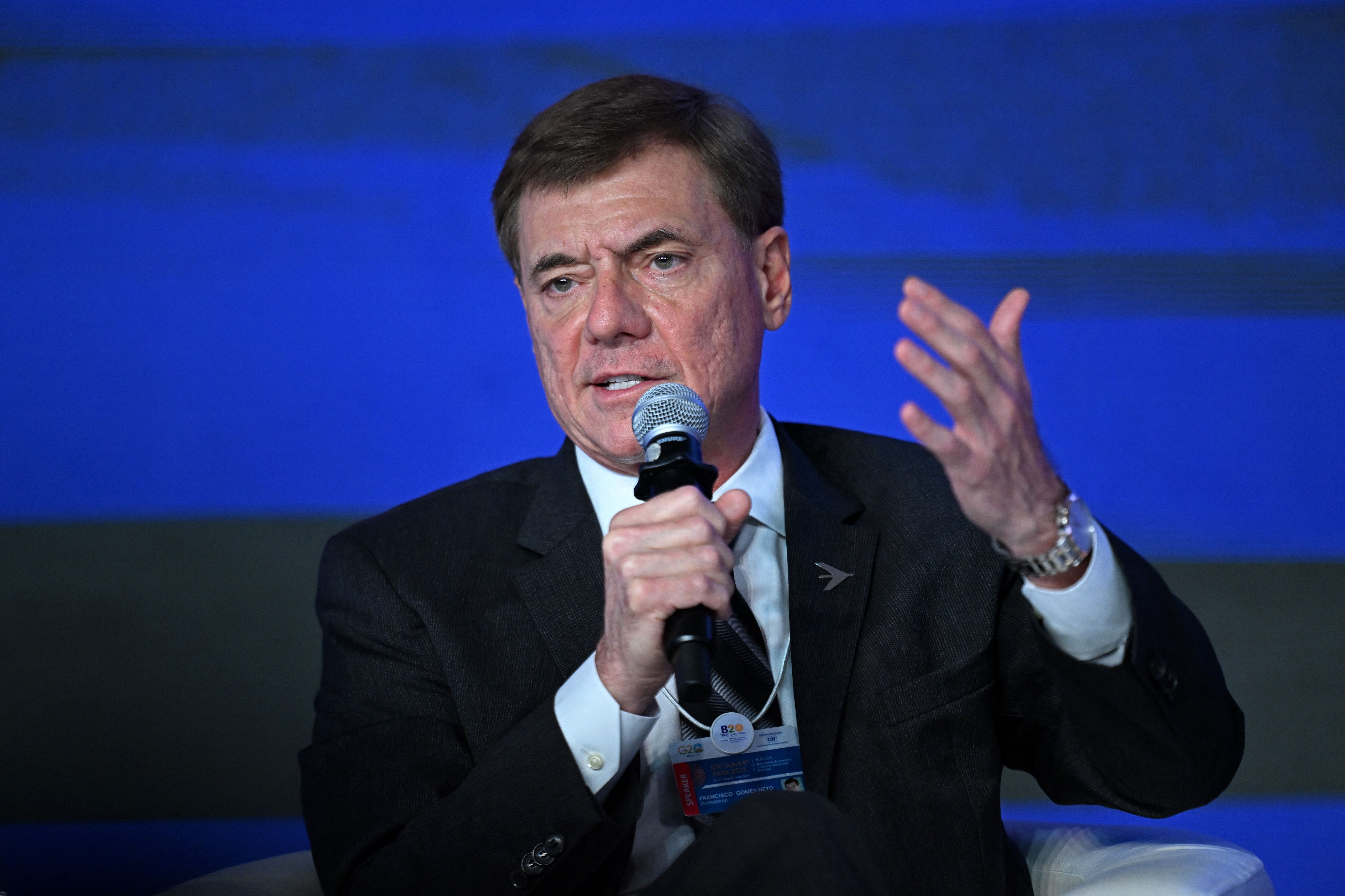 Francisco Gomes Neto, Chief Executive Officer of Embraer addresses the gathering on the first day of the three-day B20 Summit in New Delhi on August 25, 2023.