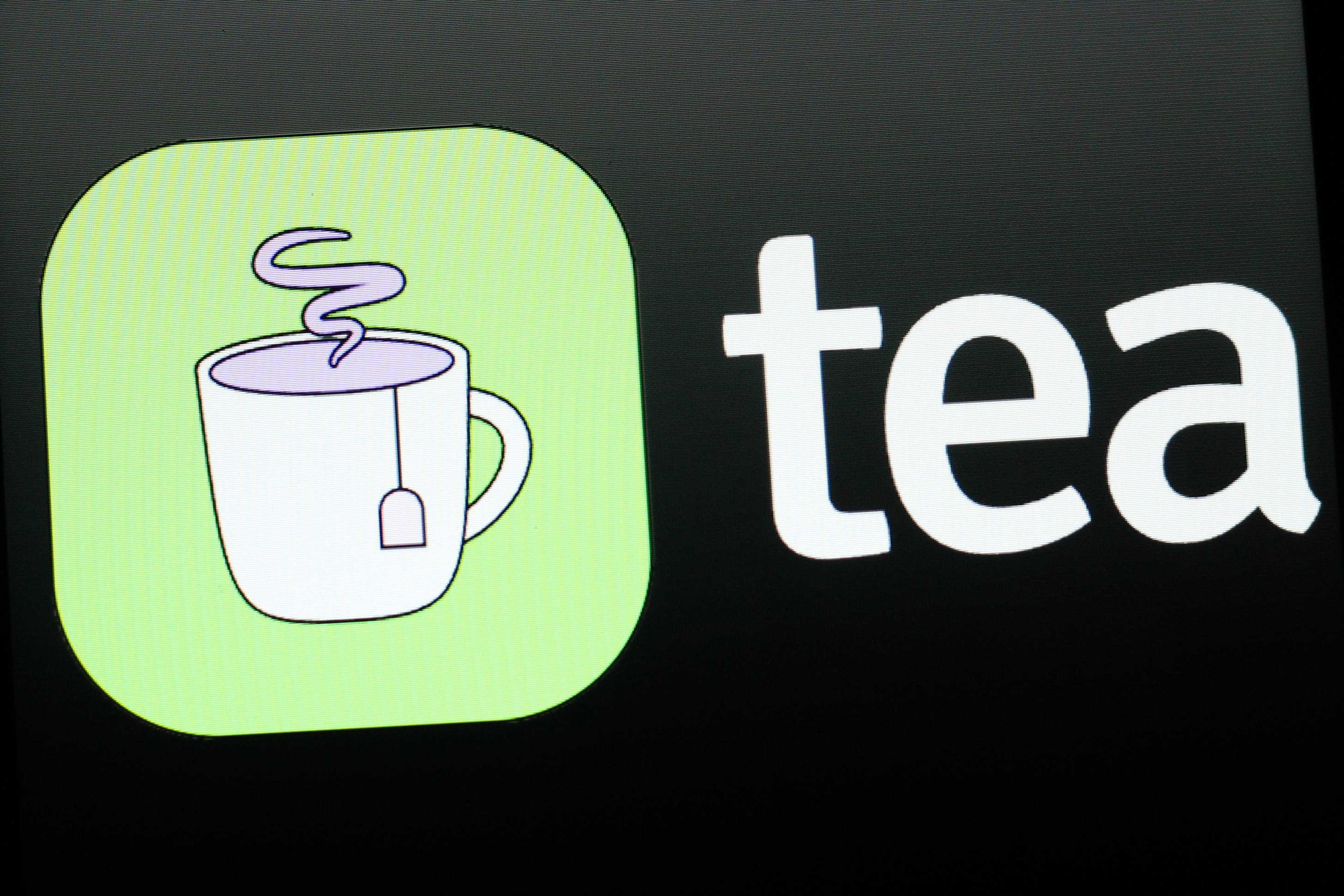 The Tea app logo on a phone.