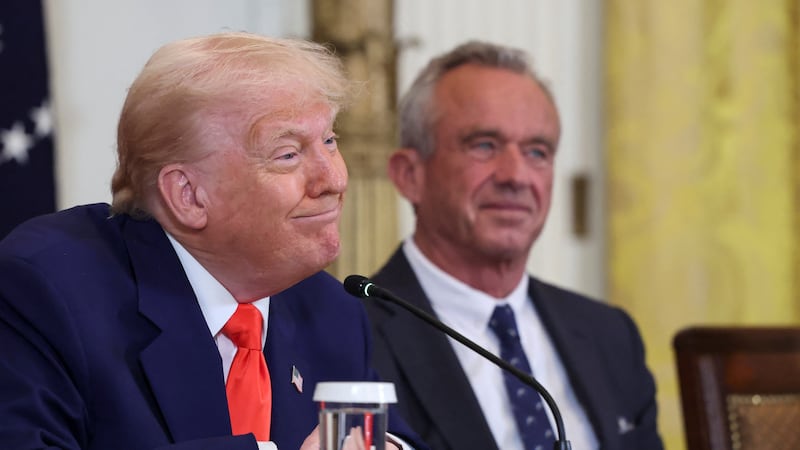 U.S. President Donald Trump and Health and Human Services (HHS) Secretary Robert F. Kennedy Jr. attend a Make America Healthy Again (MAHA) Commission event, in the East Room of the White House in Washington, D.C., U.S., May 22, 2025. REUTERS/Evelyn Hockstein