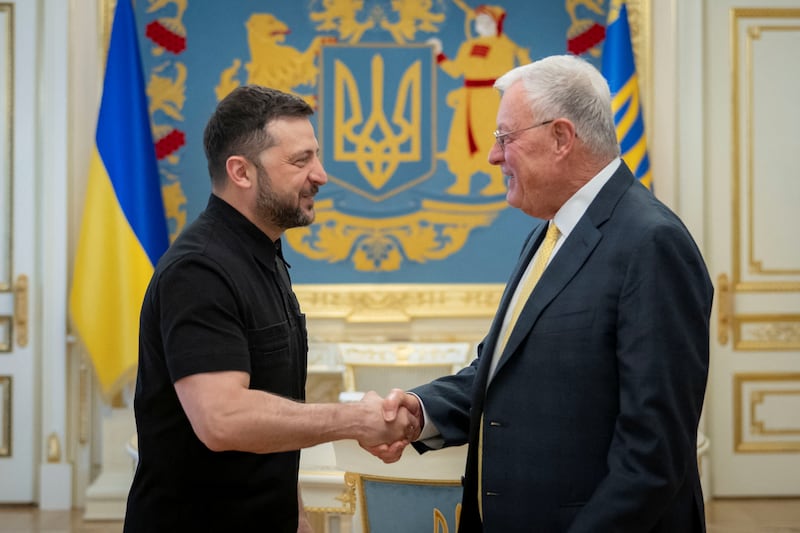 Ukrainian President Volodymyr Zelensky shakes hands with U.S. Special Envoy for Ukraine Keith Kellogg as they meet in Kyiv, Ukraine on July 14, 2025.