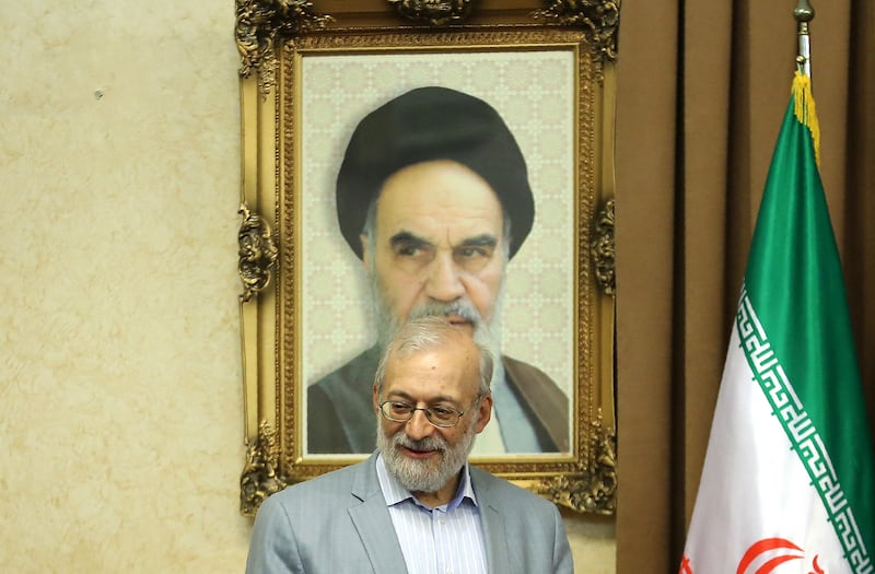Mohammad-Javad Larijani is a top advisor to Supreme Leader Ayatollah Ali Khamenei and the secretary general of the High Council for Human Rights of the Islamic Republic of Iran. Behind him hangs a photograph of the late founder of the Islamic republic, Ayatollah Ruhollah Khomeini.