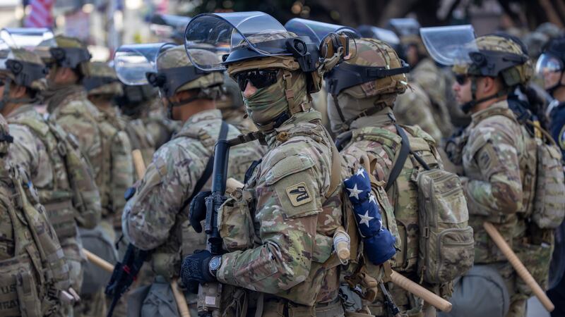 California National Guard soldiers stand guard in L.A. as protests erupted in response to a series of immigration raids in the city. Protests escalated after President Donald Trump authorized military forces to protect federal property against the wishes of city and state officials.