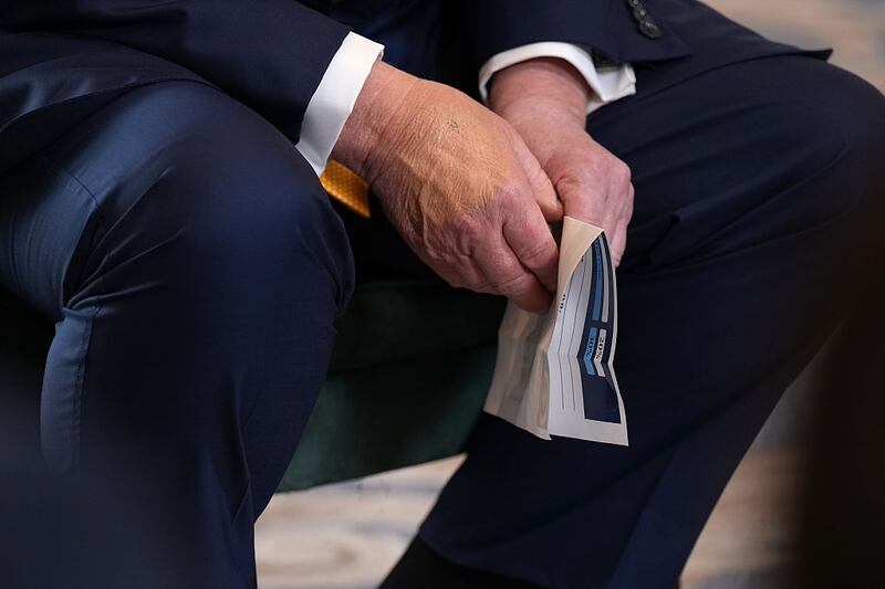 President Donald Trump announces a trade deal with the EU which he read from the paper pictured after a meeting with President of the European Commission Ursula von der Leyen at Trump Turnberry golf club on July 27, 2025 in Turnberry, Scotland. U.S. President Donald Trump is visiting his Trump Turnberry golf course, as well as Trump International Golf Links in Aberdeenshire, during a brief visit to Scotland from July 25 to 29.