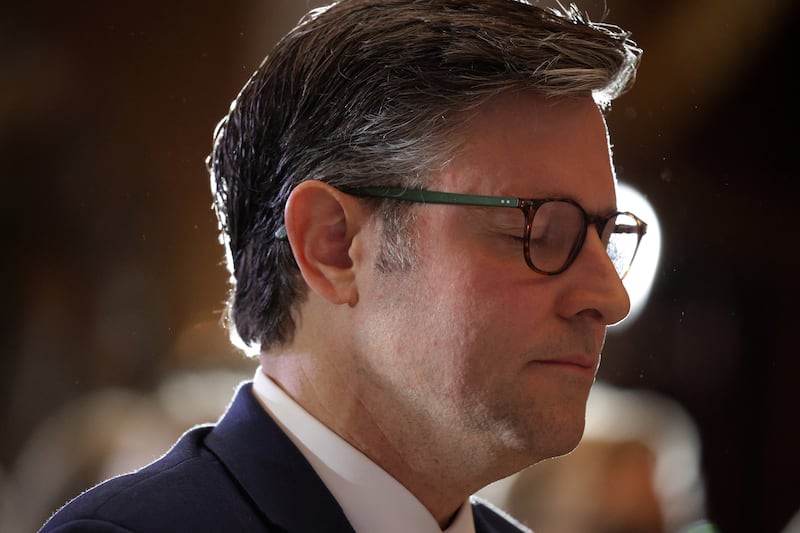 Speaker of the House Rep. Mike Johnson (R-LA) participates in a prayer during a Congressional Gold Medal ceremony at the Statuary Hall of the U.S. Capitol on July 9, 2025 in Washington, DC.