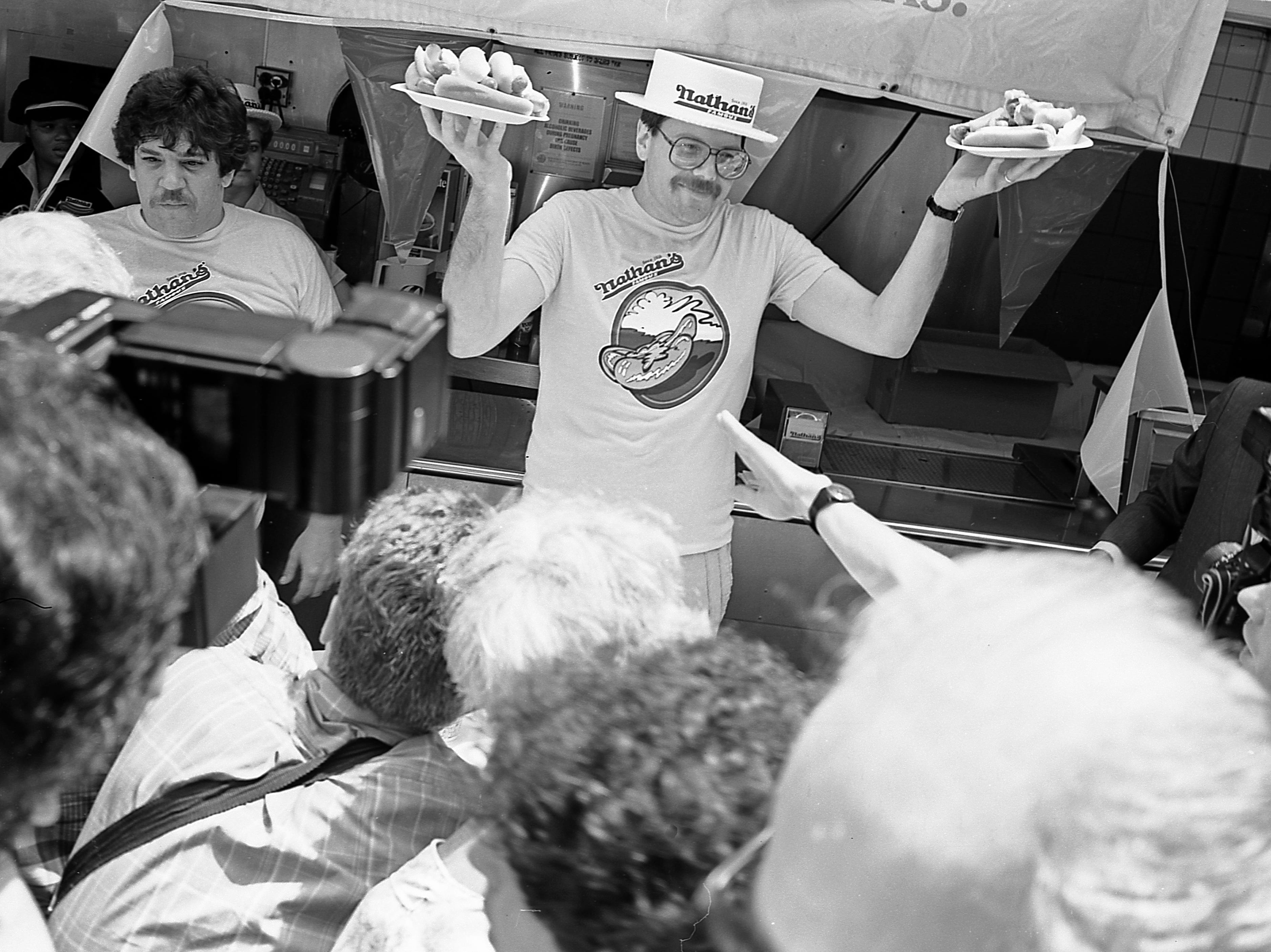 Contestants at the Nathan's Hot Dog Eating Contest at Coney Island, July 4, 1987.