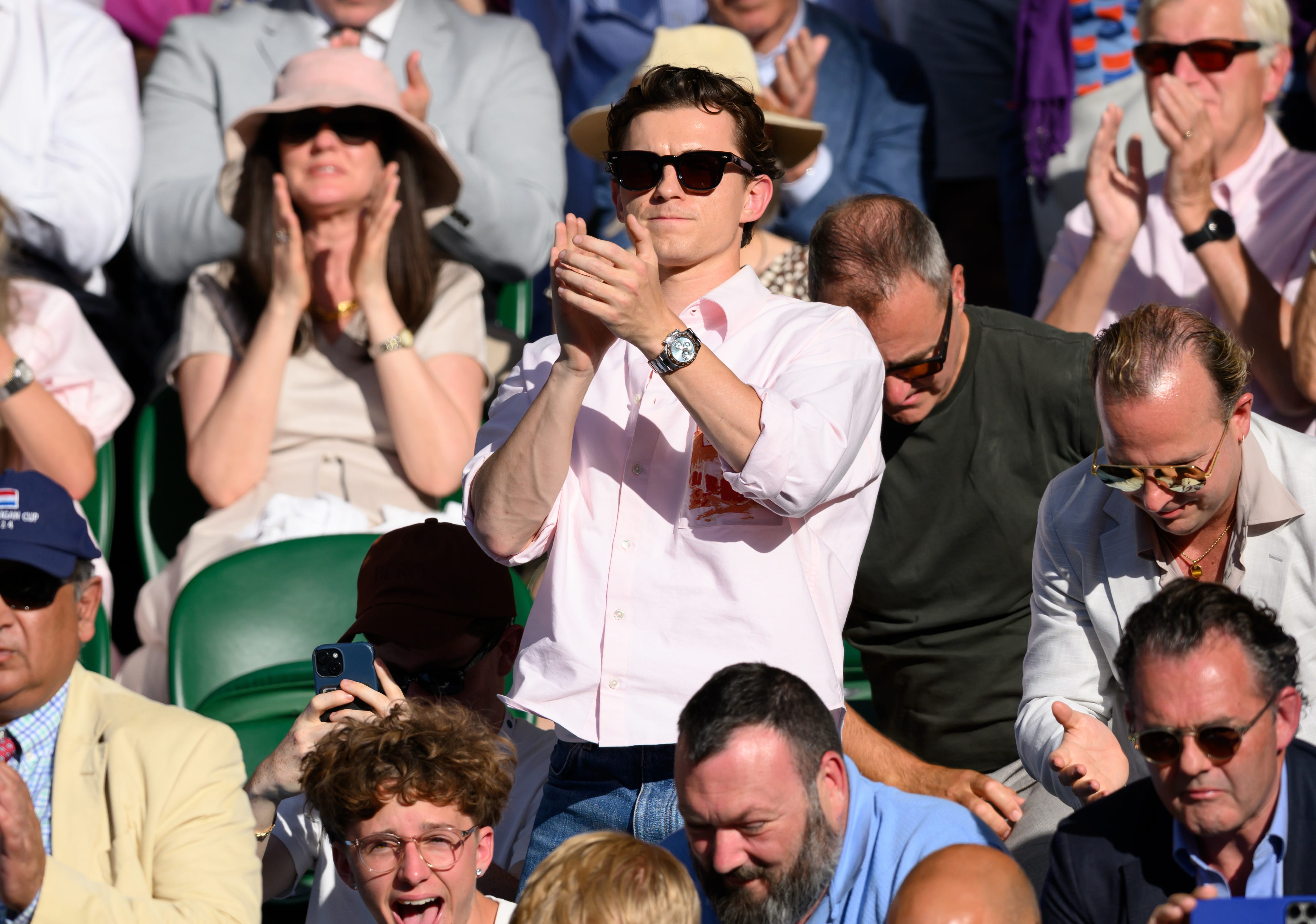 Tom Holland attends Wimbledon in July 2025.