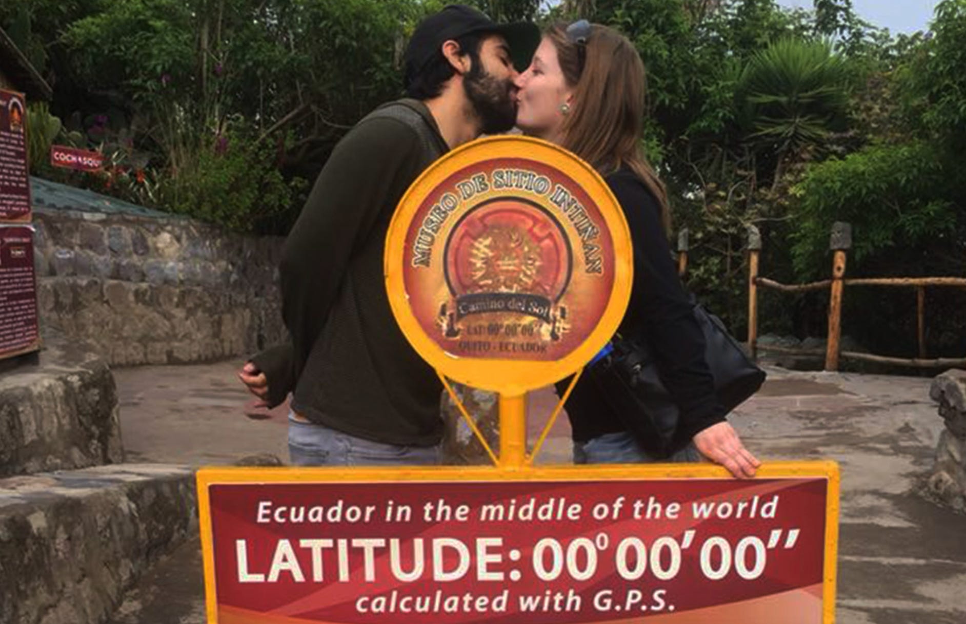 The writer and her husband kissing in Ecuador.