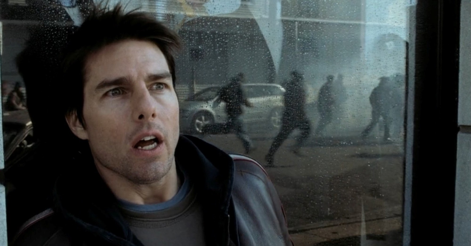Ray (Tom Cruise) pauses to catch his breath while fleeing attacking aliens in the 2005 film War of the Worlds. 