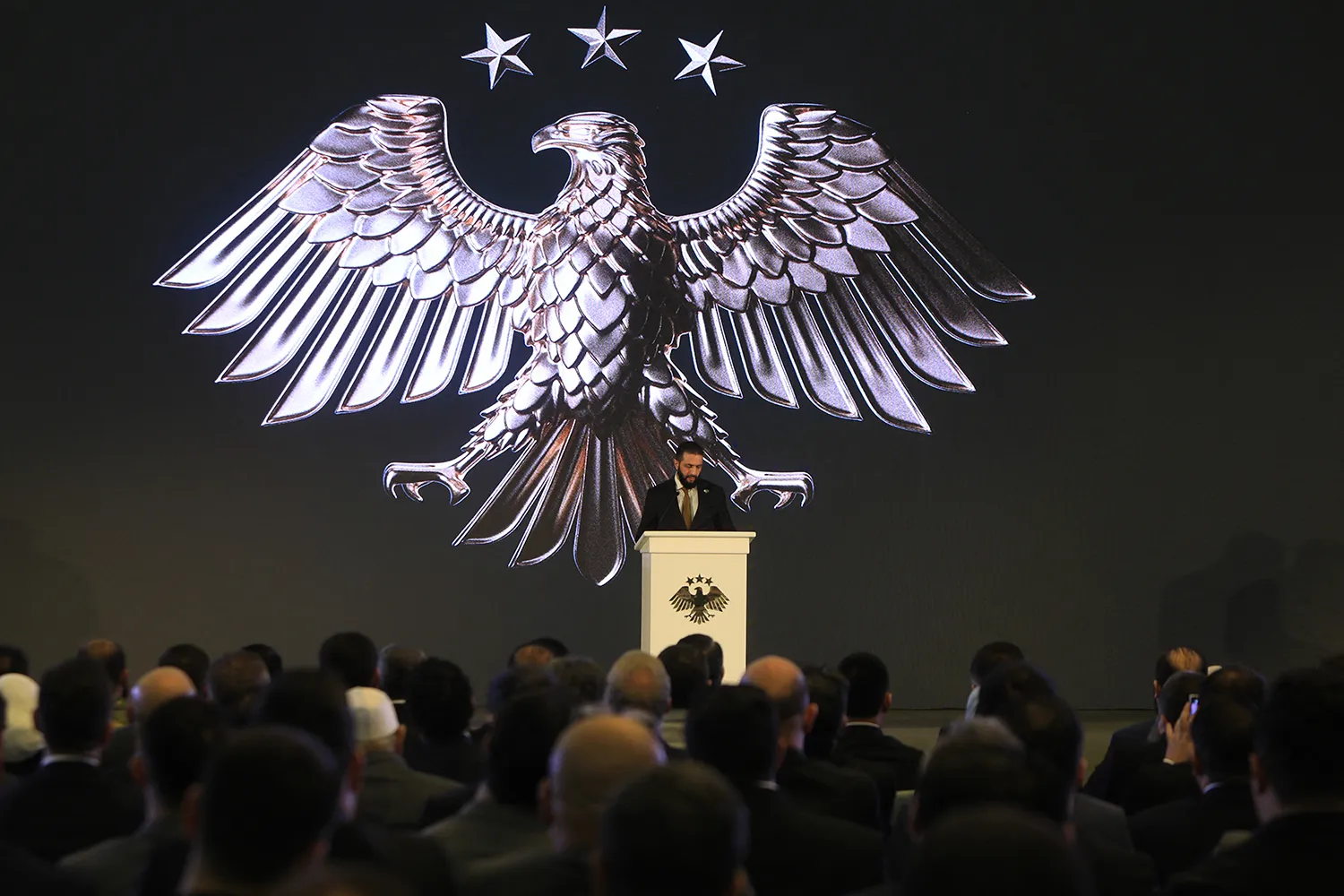 Syrian interim President Ahmed al-Sharaa delivers a speech in Damascus.
