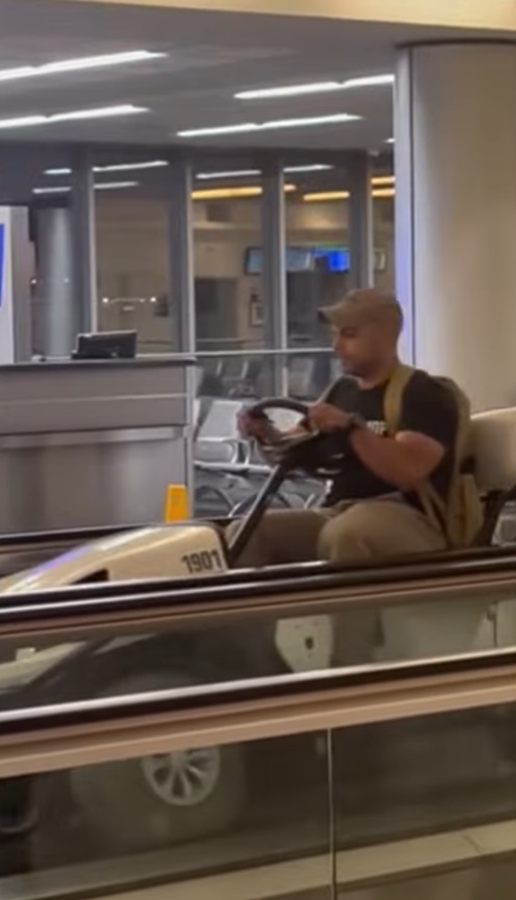 Kevin Sinning was captured on video driving a stolen airport golf cart onto a people mover walkway at Buffalo Niagara International Airport on July 28, 2025.
