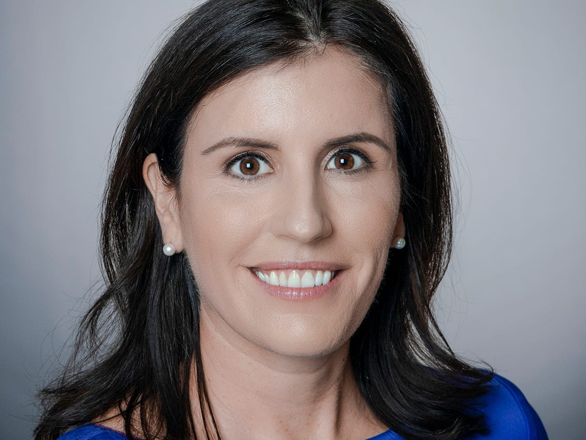 A woman smiles