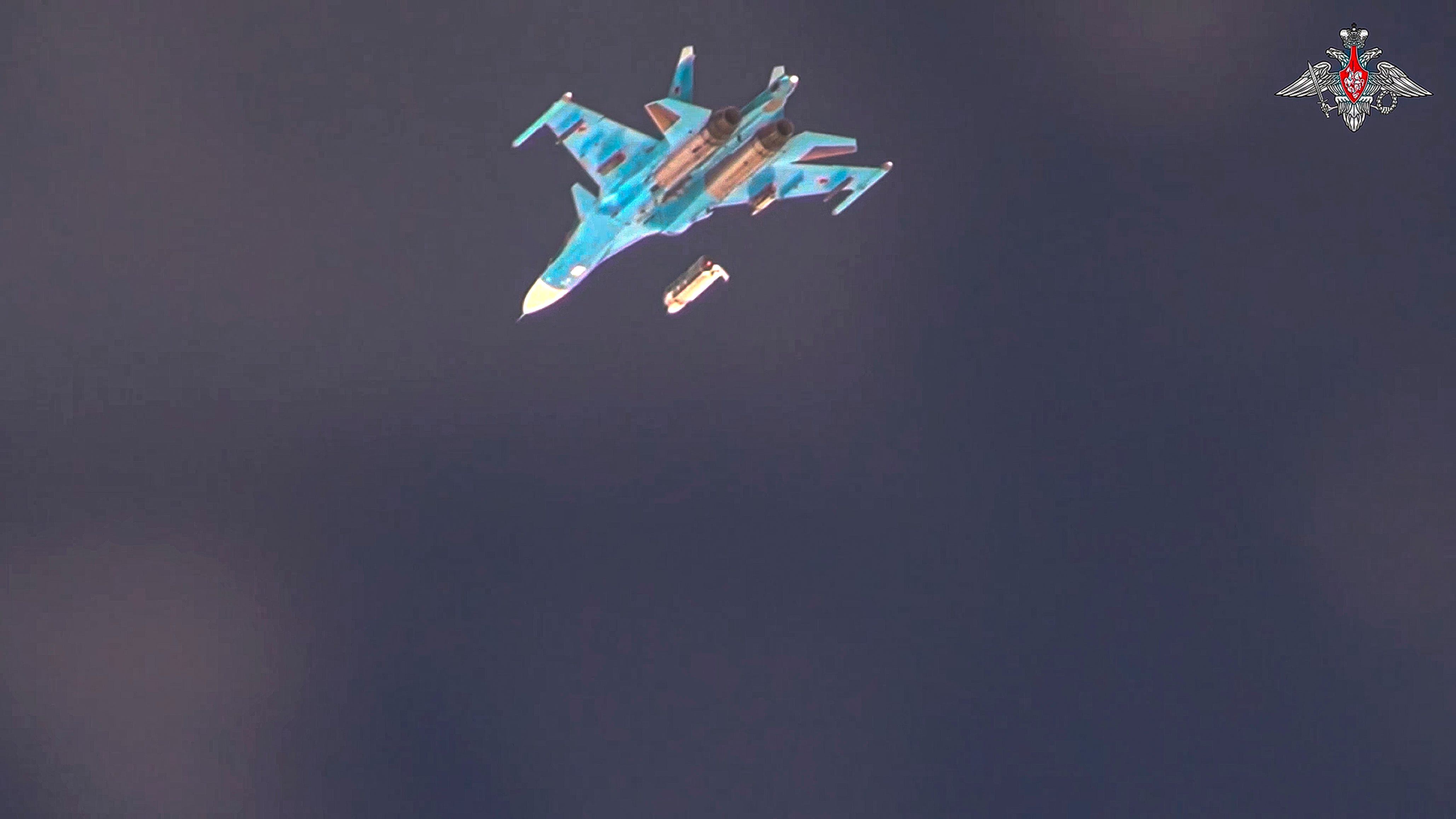 A Russian Su-34 bomber drops a glide bomb to strike Ukrainian positions in August 2024.