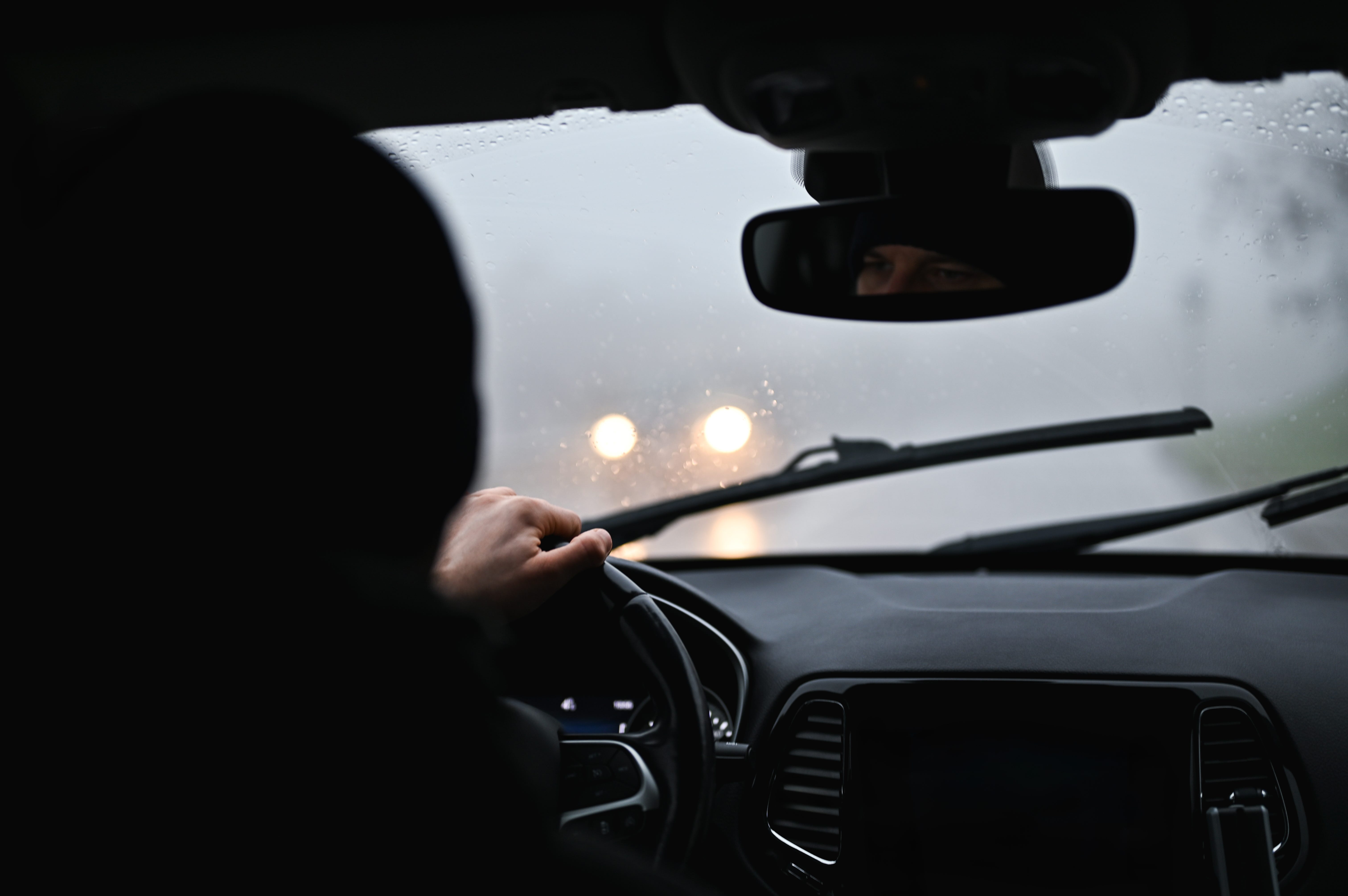 man driving in a car