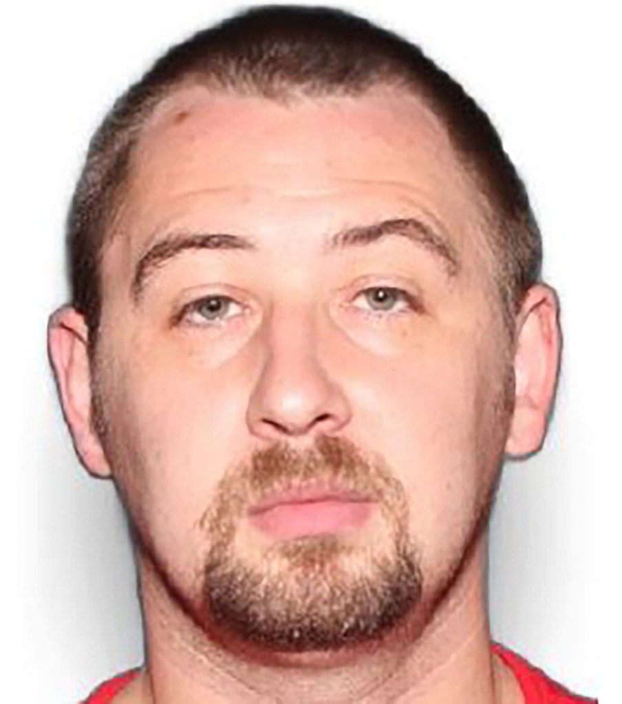 Mugshot of Austin Robert Drummond, suspect in four counts of first-degree murder.