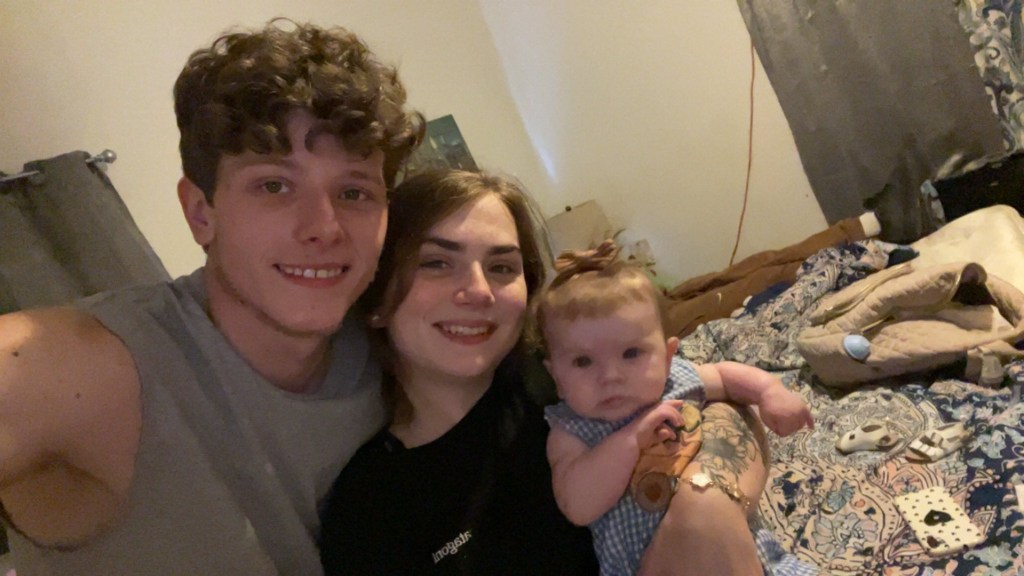 Matthew Wilson and Adrianna Williams with their baby daughter.