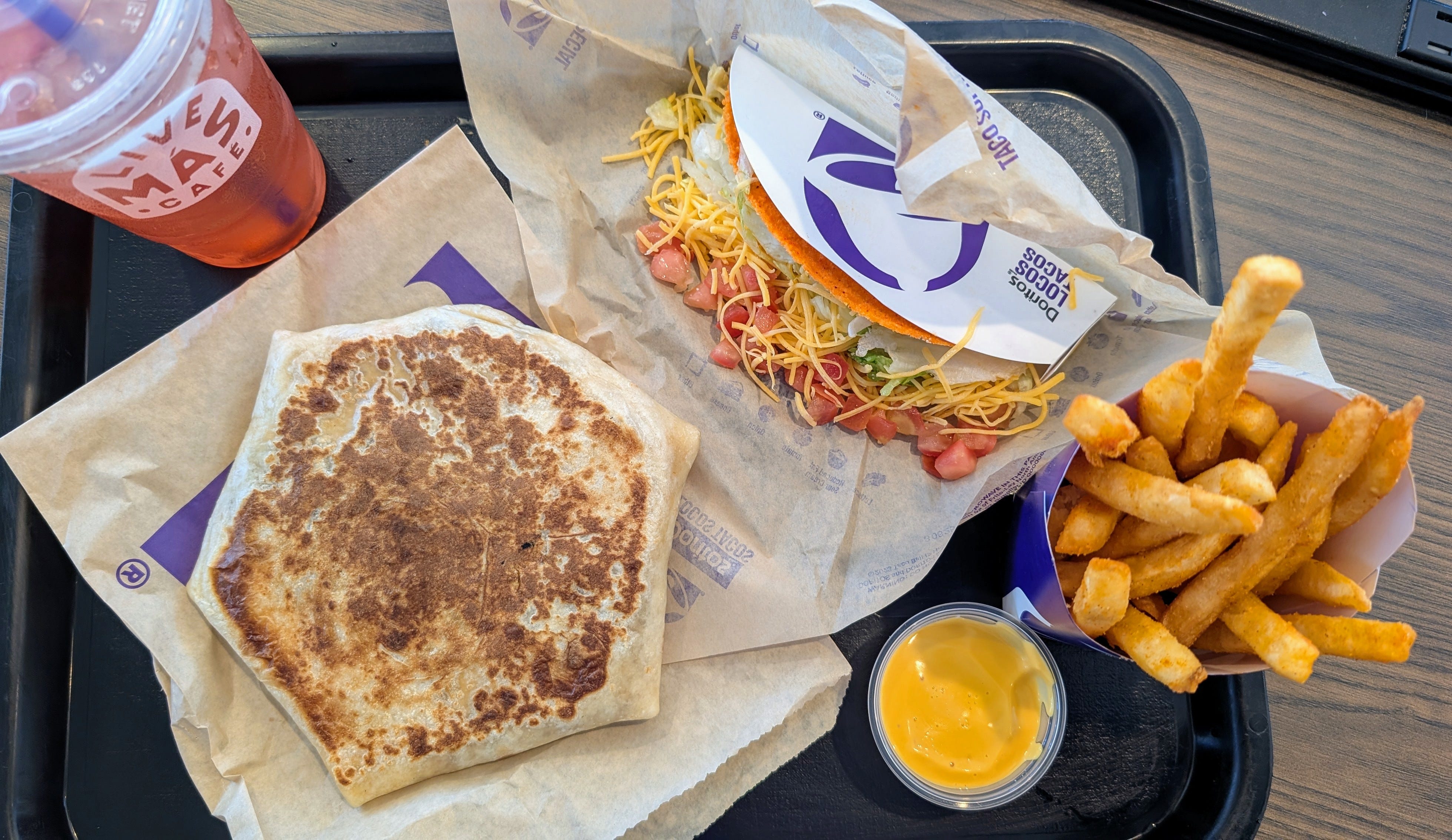 Taco Bell and dorito taco at Taco bell on tray