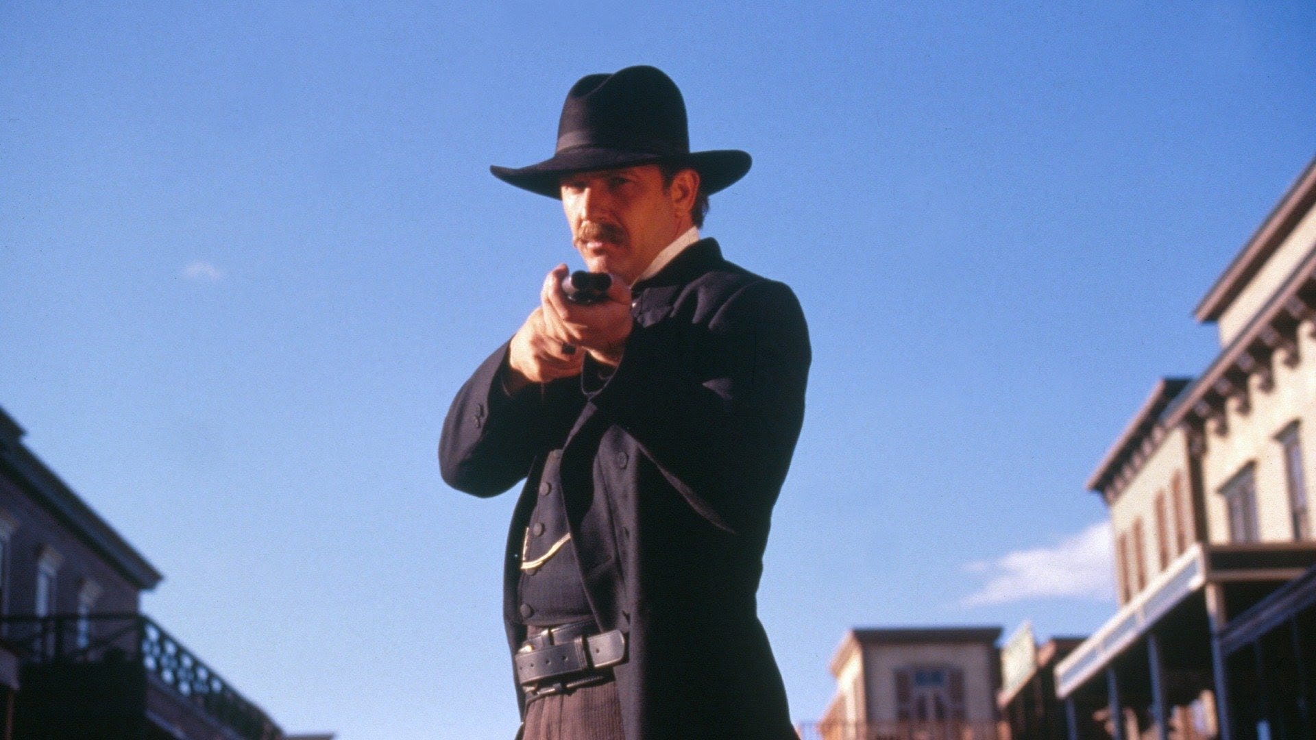 Kevin Costner pointing a guy