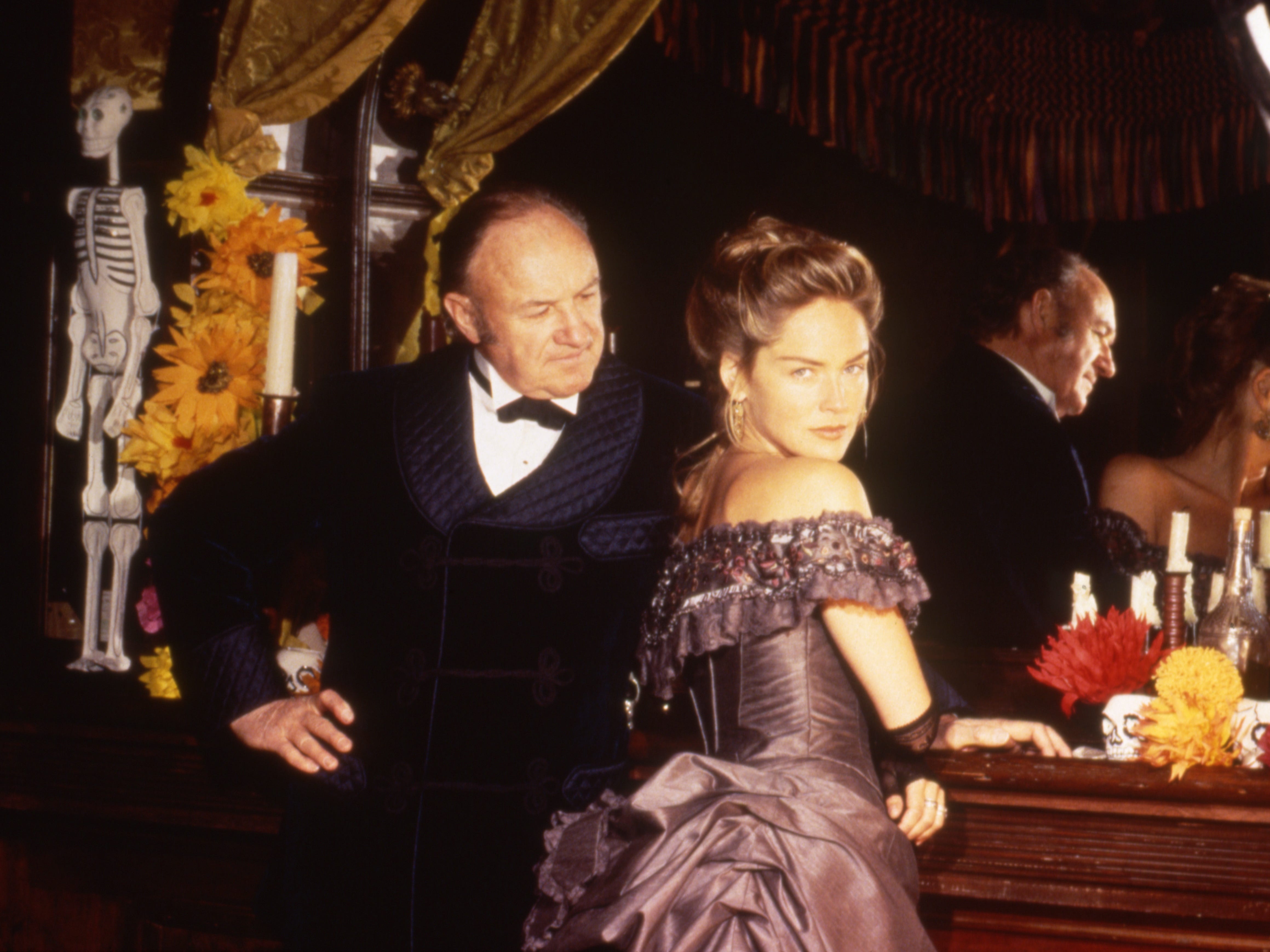Gene Hackman looking at Sharon Stone