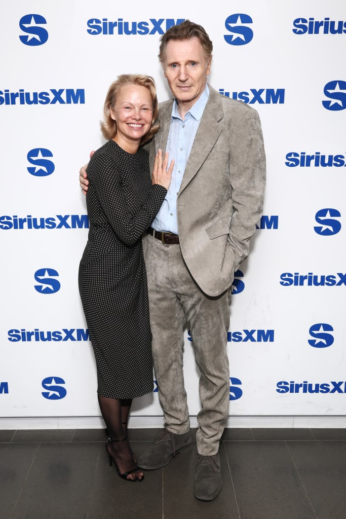 NEW YORK, NEW YORK - JULY 30: Pamela Anderson and Liam Neeson attend SiriusXM's Town Hall with the cast of 