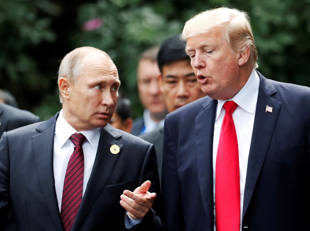 Presidents Trump and Putin in conversation.