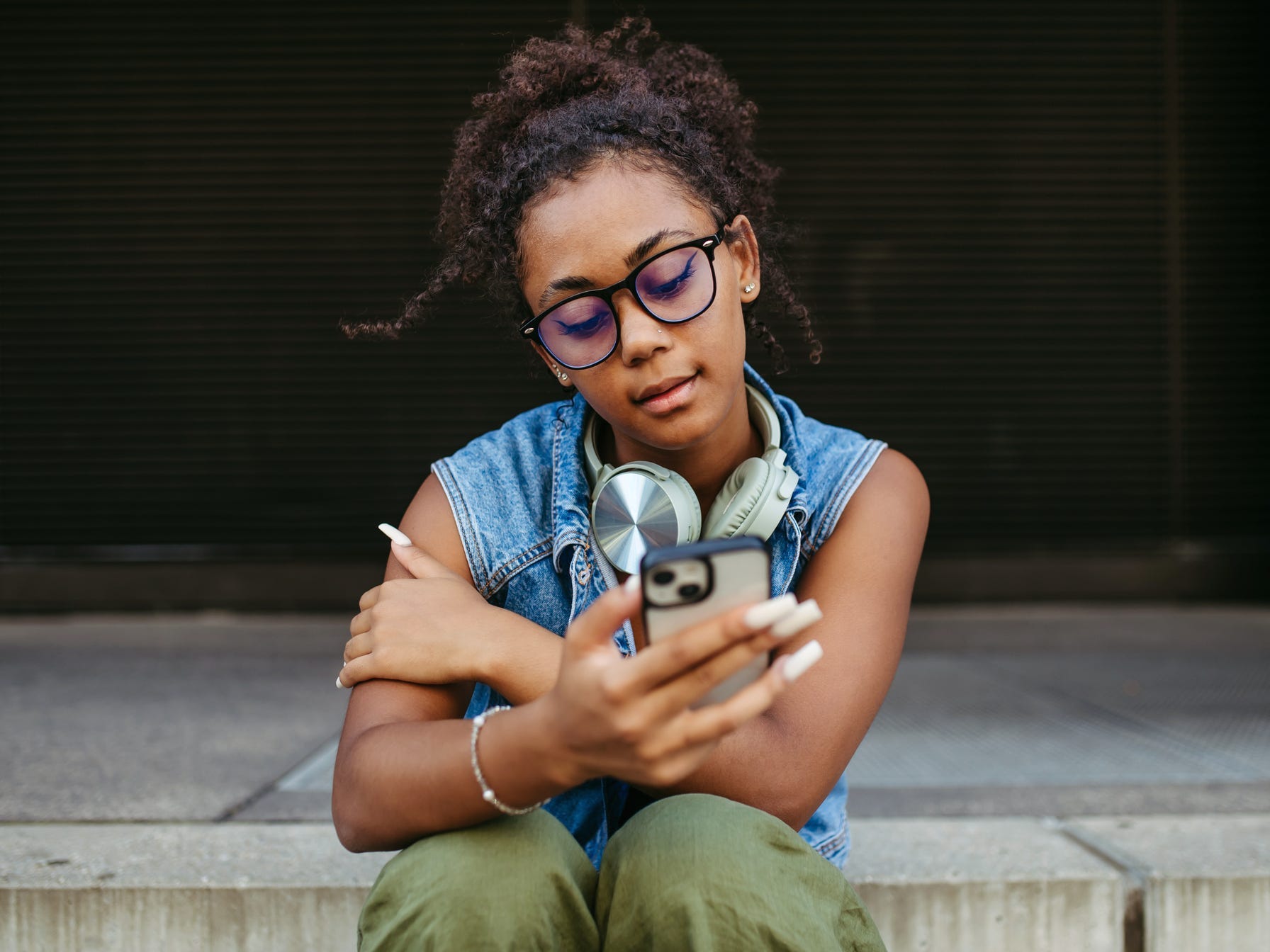 A teen girl on phone