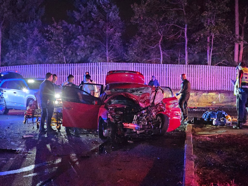 Photo of a fatal car crash scene at night.