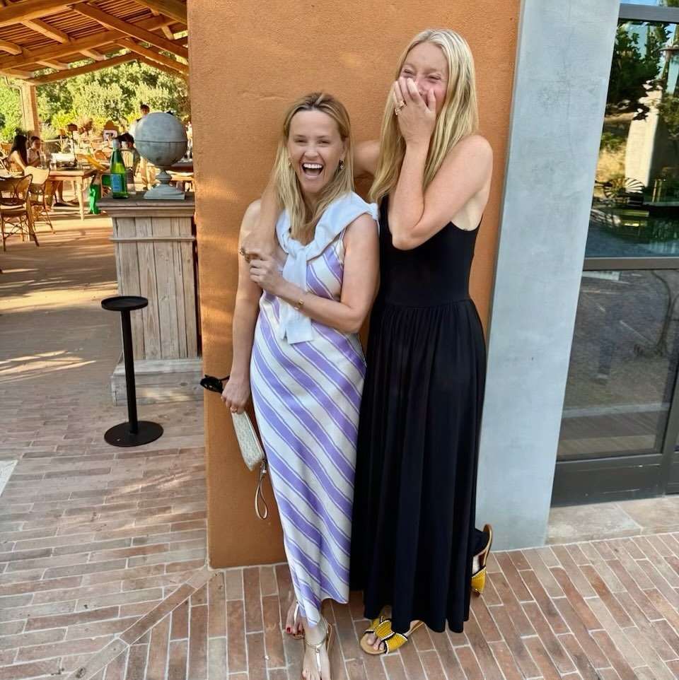 Reese Witherspoon (left) and Gwyneth Paltrow share a laugh.
