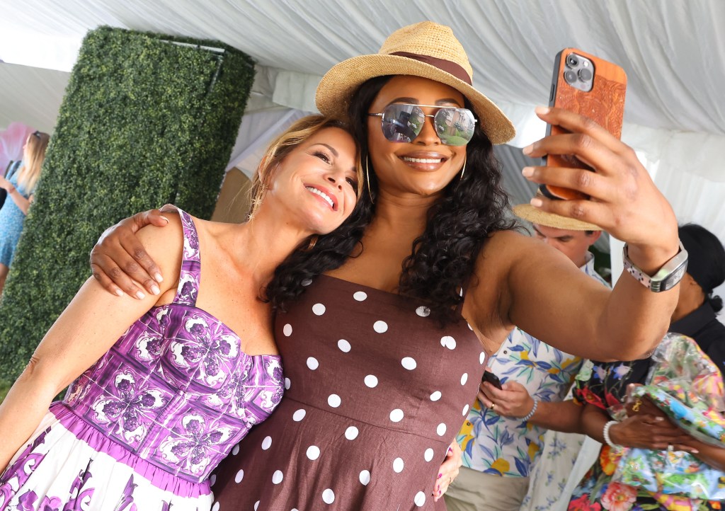 Fellow “Housewives” Jill Zarin (left) and Cynthia Bailey smile for a selfie at a Hamptons benefit in honor of Zarin’s late husband.
