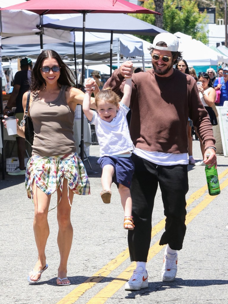 Married couple and “Dancing With the Stars” vets Jenna Johnson and Val Chmerkovskiy twirl around with son Rome, 2, while out in California.
