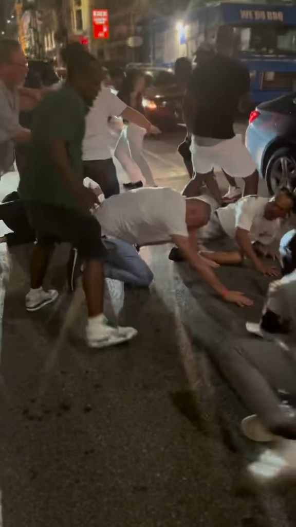 The suspects seen fighting with the victims. 