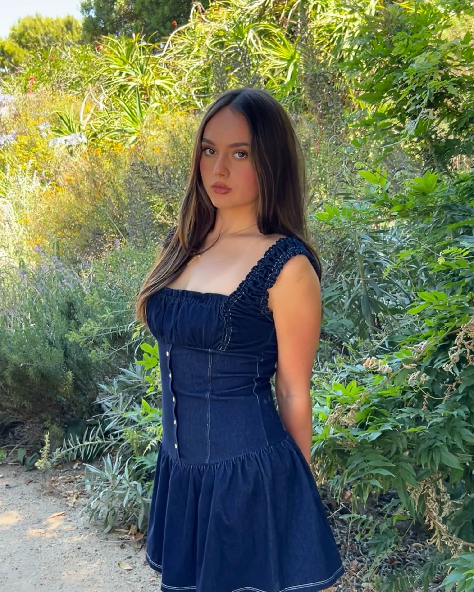 Jolie Dodd in a blue denim dress. 