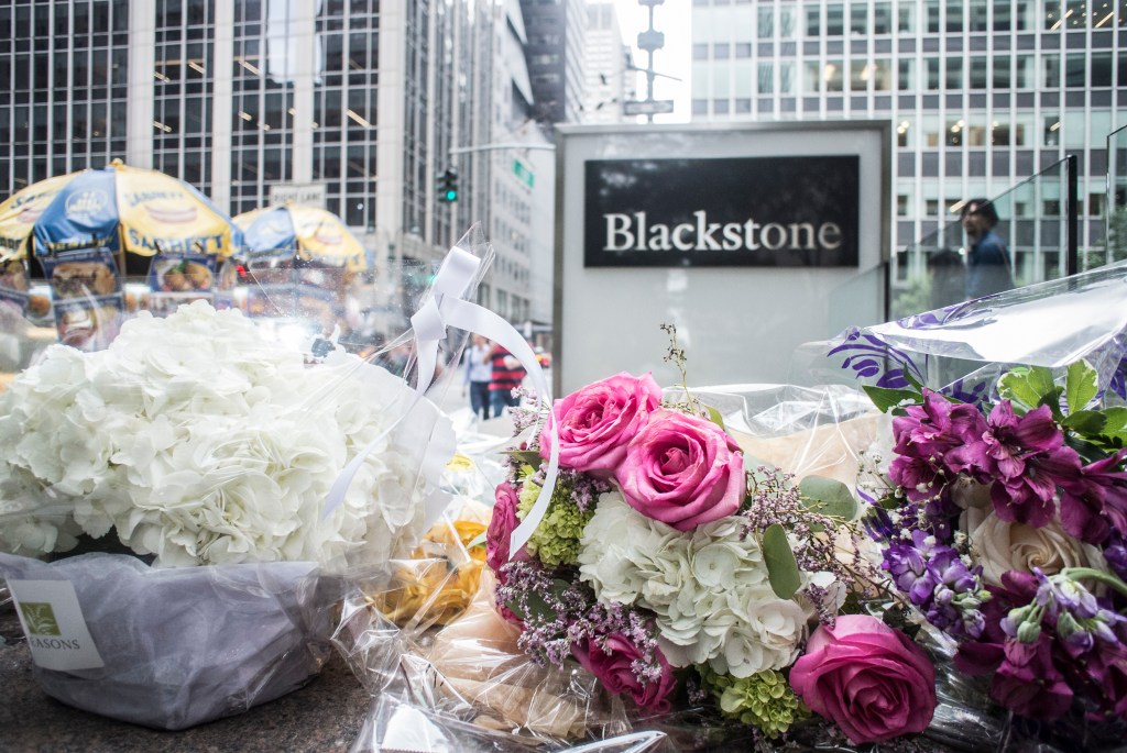 Memorial flowers in front of the Blackstone building. 