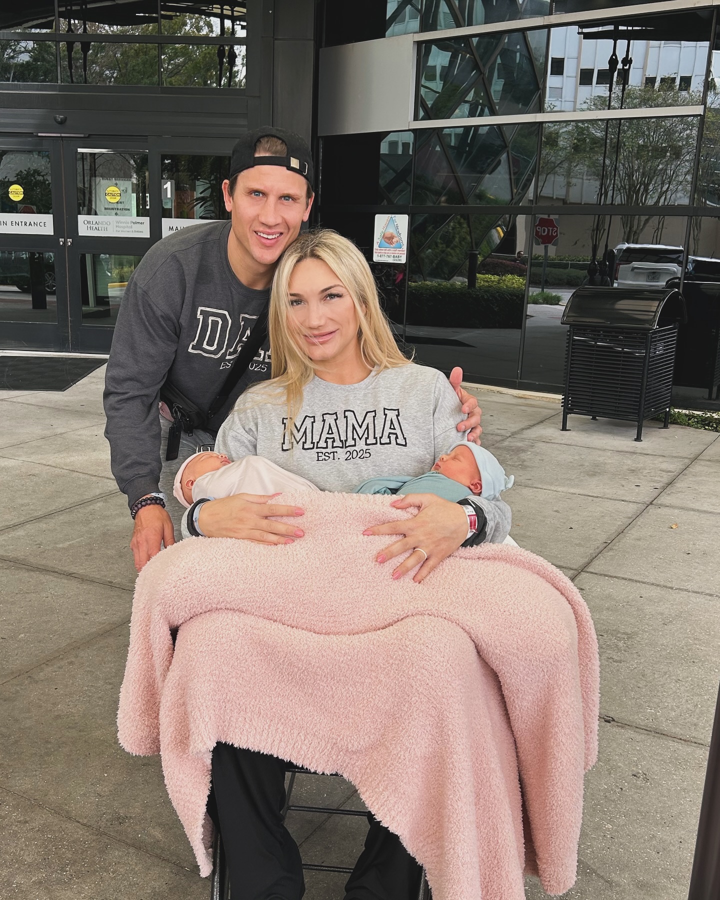 Steve Olesky and Brooke Hogan with their babies. 
