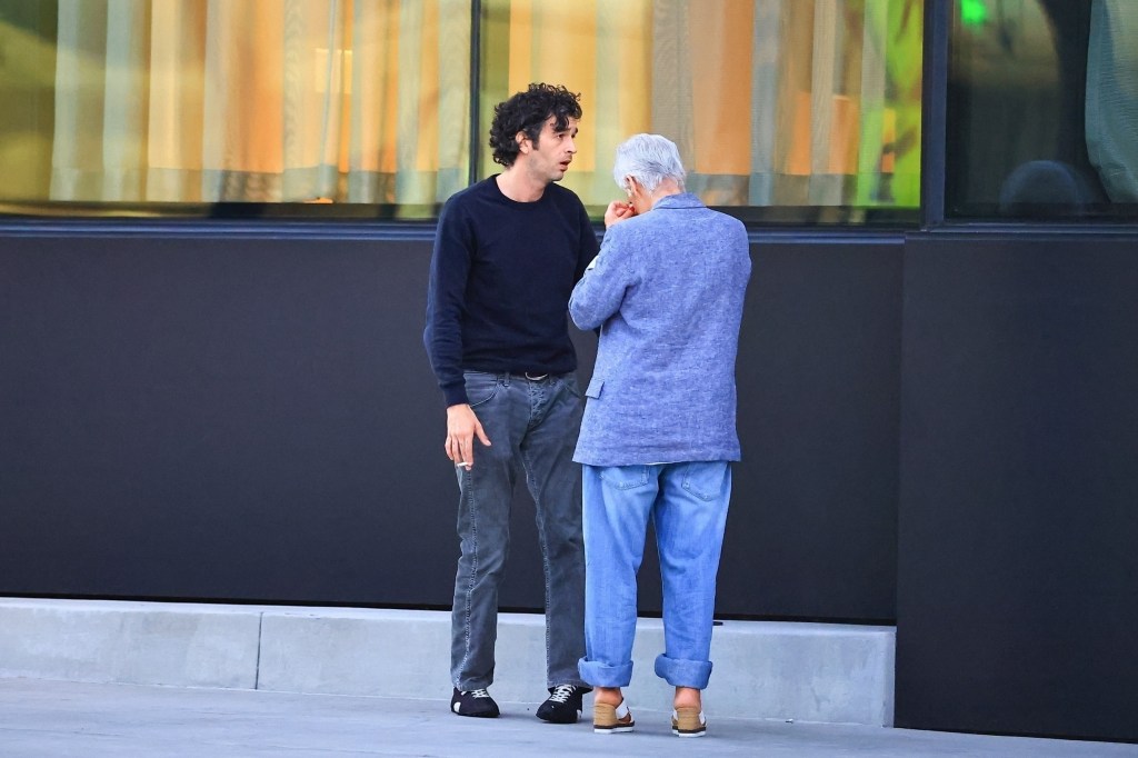*EXCLUSIVE* Los Angeles, CA    Matty Healy and his girlfriend, Gabrielle Bechtel, were seen leaving a romantic dinner at Stella restaurant. Matt took some time to smoke a cigarette outside with his mother, sitting on the sidewalk, and his mother started crying to him. Recently, his mother said that she didn't want to be the daughter-in-law of his ex-girlfriend, Taylor Swift
