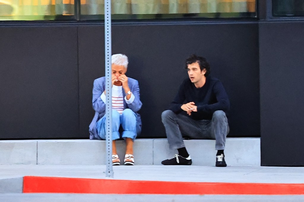 *EXCLUSIVE* Los Angeles, CA    Matty Healy and his girlfriend, Gabrielle Bechtel, were seen leaving a romantic dinner at Stella restaurant. Matt took some time to smoke a cigarette outside with his mother, sitting on the sidewalk, and his mother started crying to him. Recently, his mother said that she didn't want to be the daughter-in-law of his ex-girlfriend, Taylor Swift
