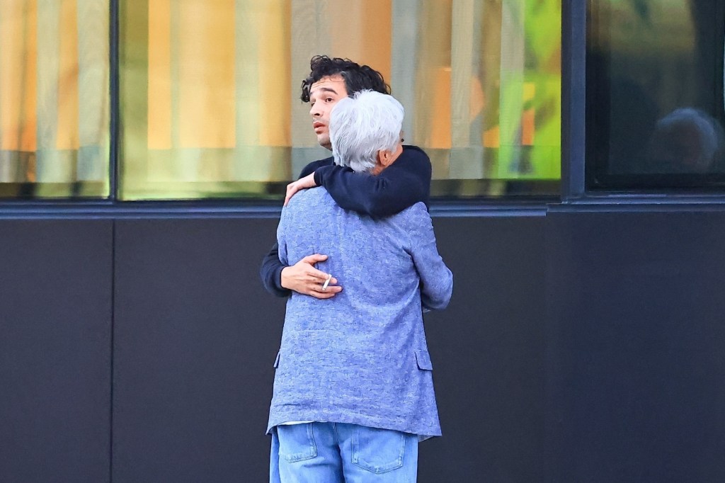 *EXCLUSIVE* Los Angeles, CA    Matty Healy and his girlfriend, Gabrielle Bechtel, were seen leaving a romantic dinner at Stella restaurant. Matt took some time to smoke a cigarette outside with his mother, sitting on the sidewalk, and his mother started crying to him. Recently, his mother said that she didn't want to be the daughter-in-law of his ex-girlfriend, Taylor Swift
