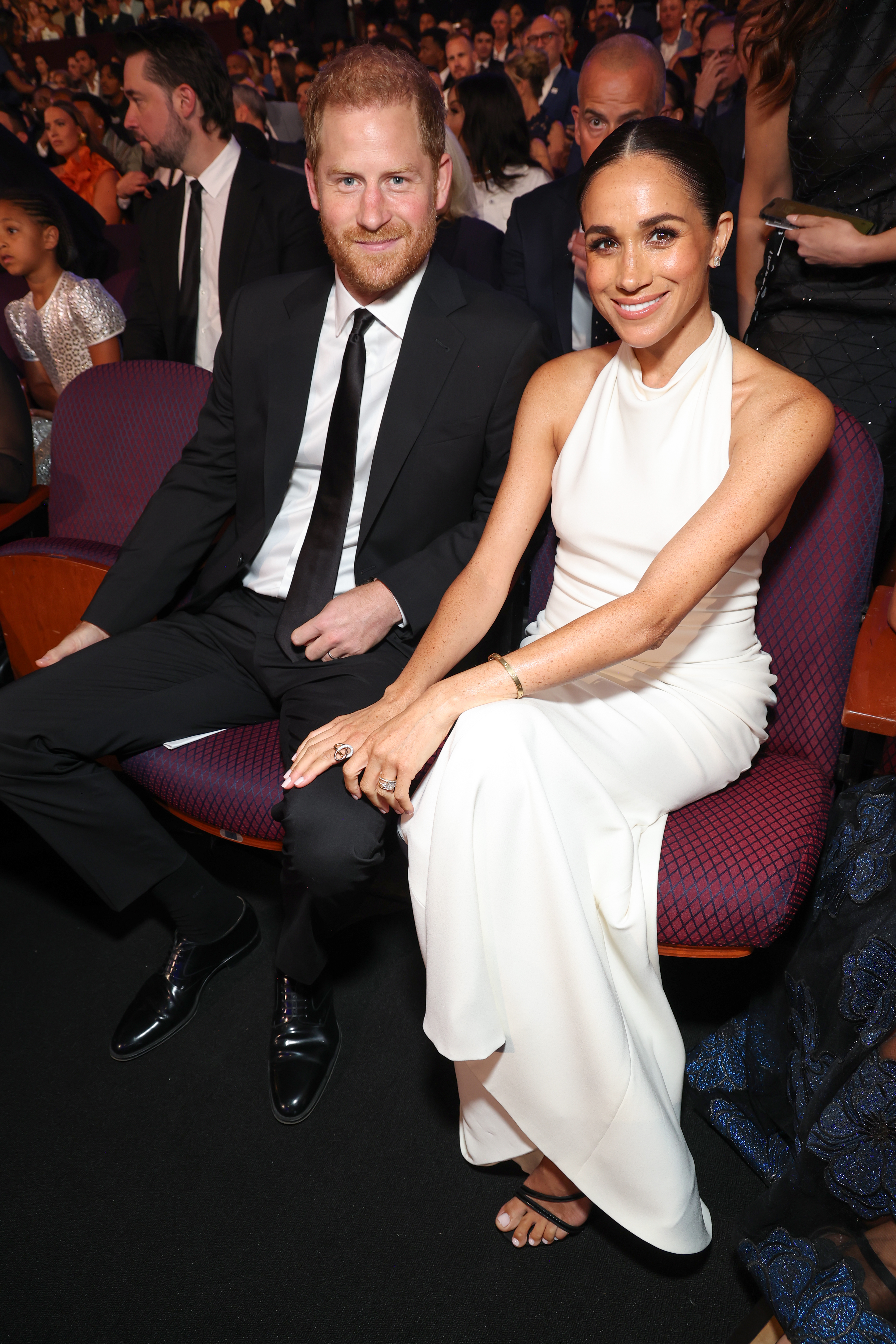 Meghan Markle and Prince Harry at an event. 