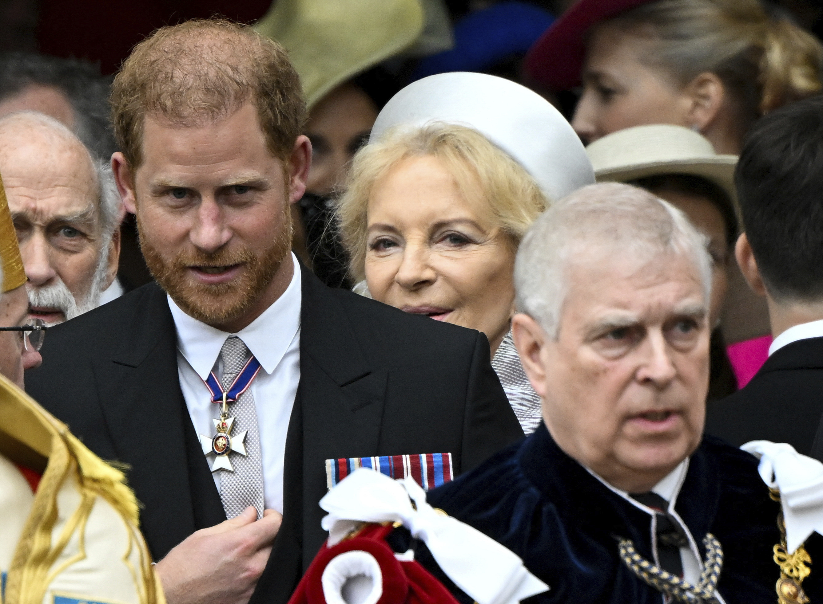 Prince Harry and Prince Andrew in royal regalia. 