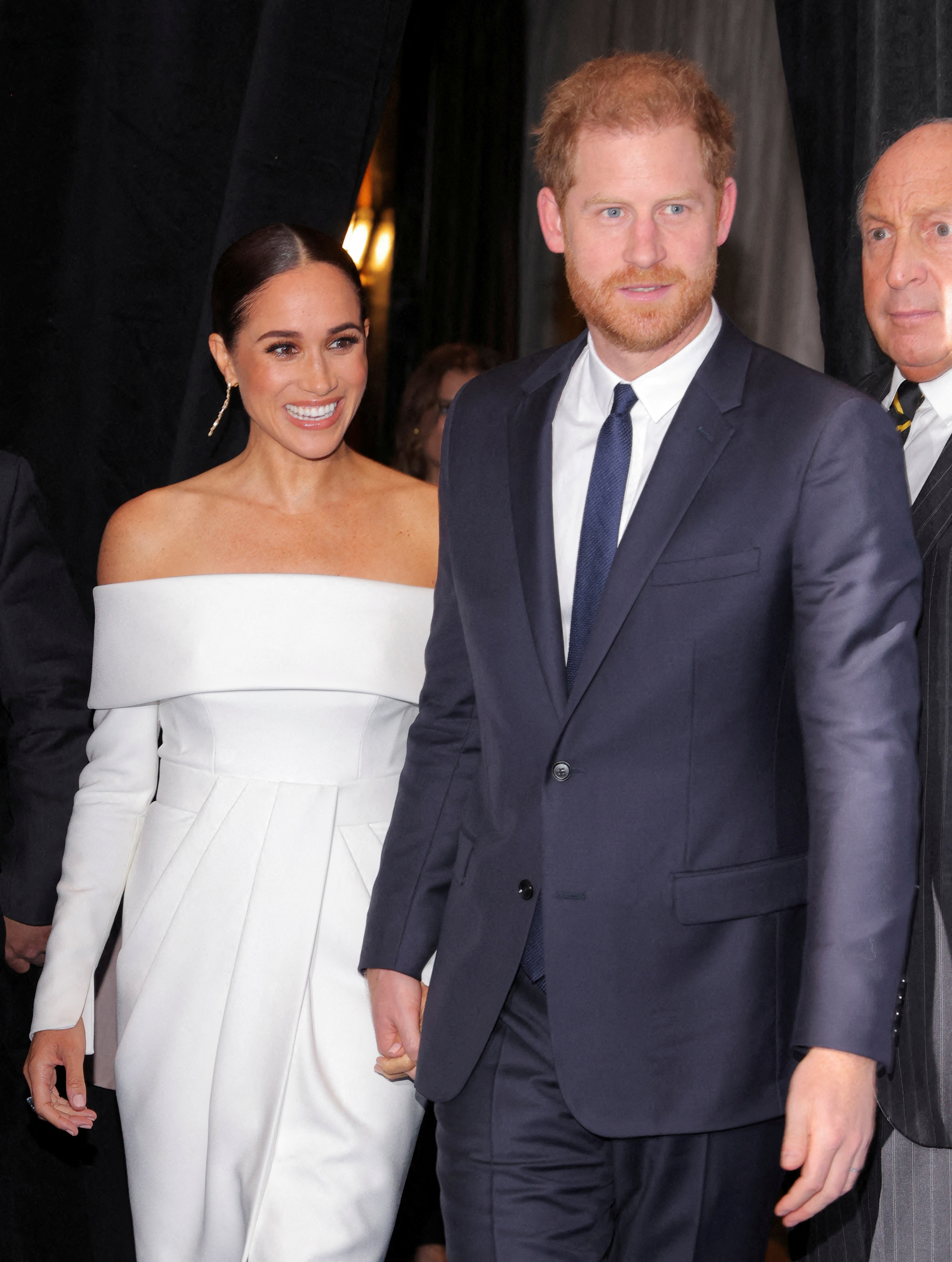 Meghan Markle and Prince Harry at an event. 