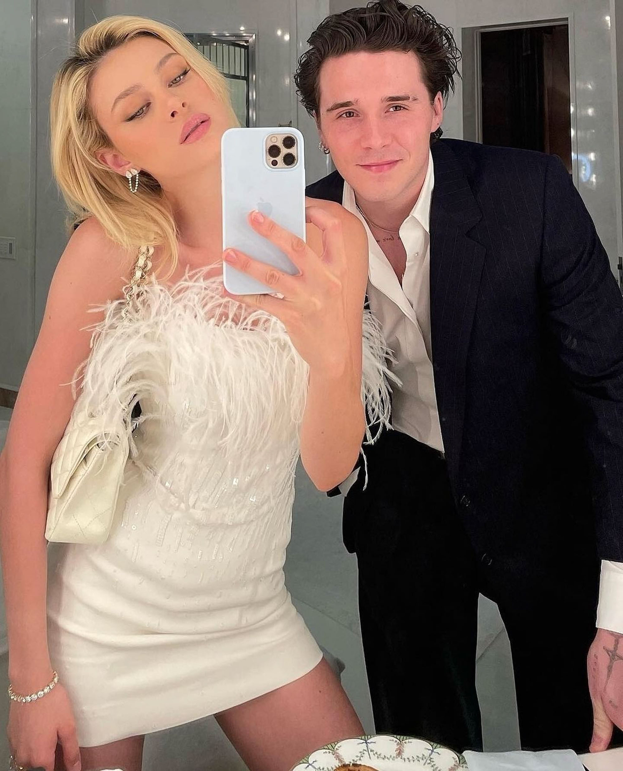 Nicola Peltz and Brooklyn Beckham in a mirror selfie. 