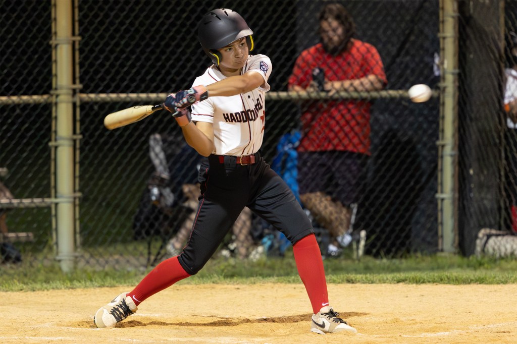 Young baseball player batting.