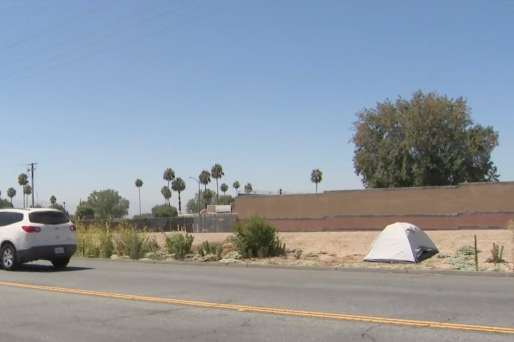 Tent near a road in San Bernardino.