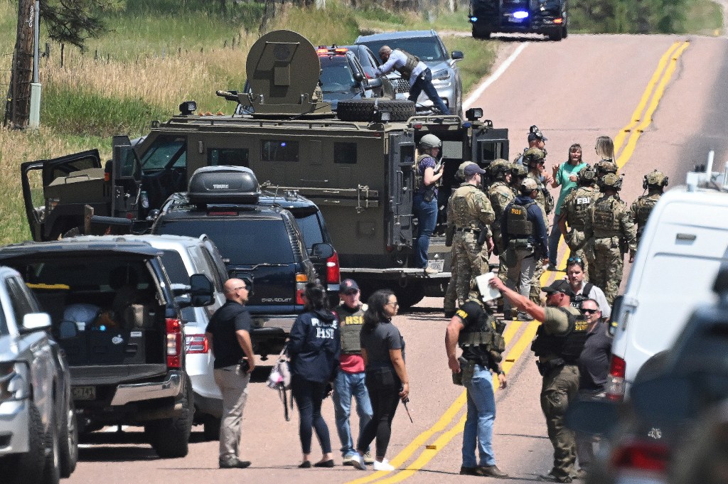Law enforcement officers at the scene of a shooting in Black Forest, Colorado.