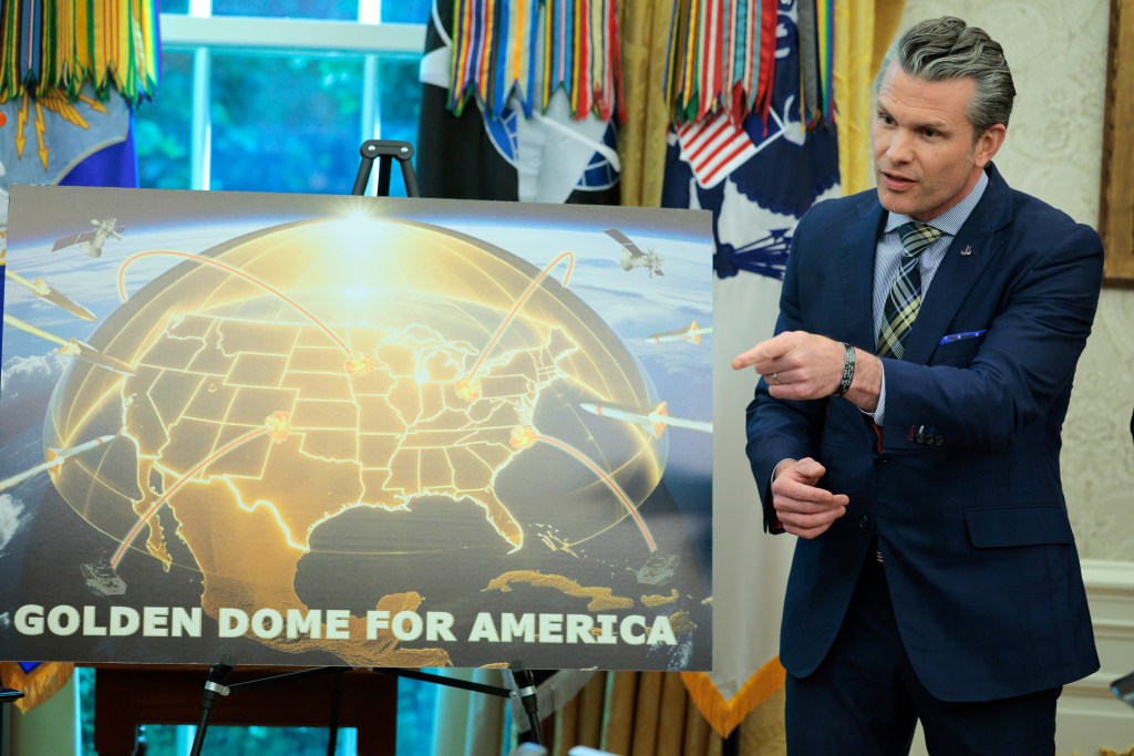 Pete Hegseth presenting the Golden Dome missile defense system in the Oval Office.