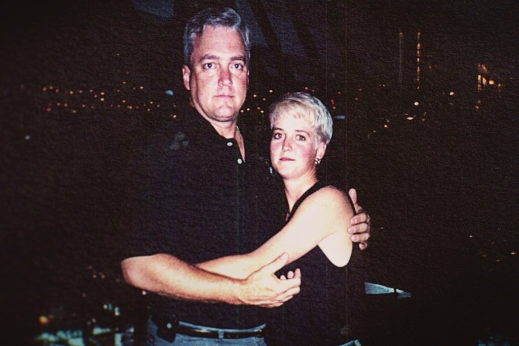 Photo of a man and woman embracing.