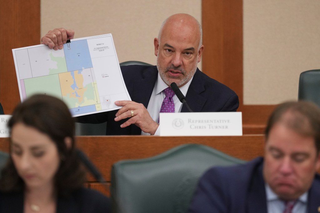 Texas Representative Chris Turner presenting a map of congressional districts during a redistricting hearing.