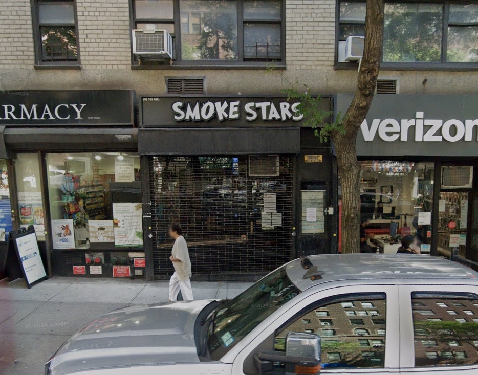 Street view of a closed cannabis dispensary, Smoke Stars, located between 54th and 55th streets.