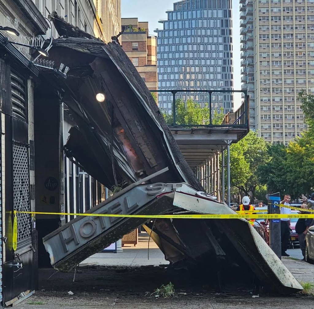 Collapsed awning and hotel sign at Hotel St. George.