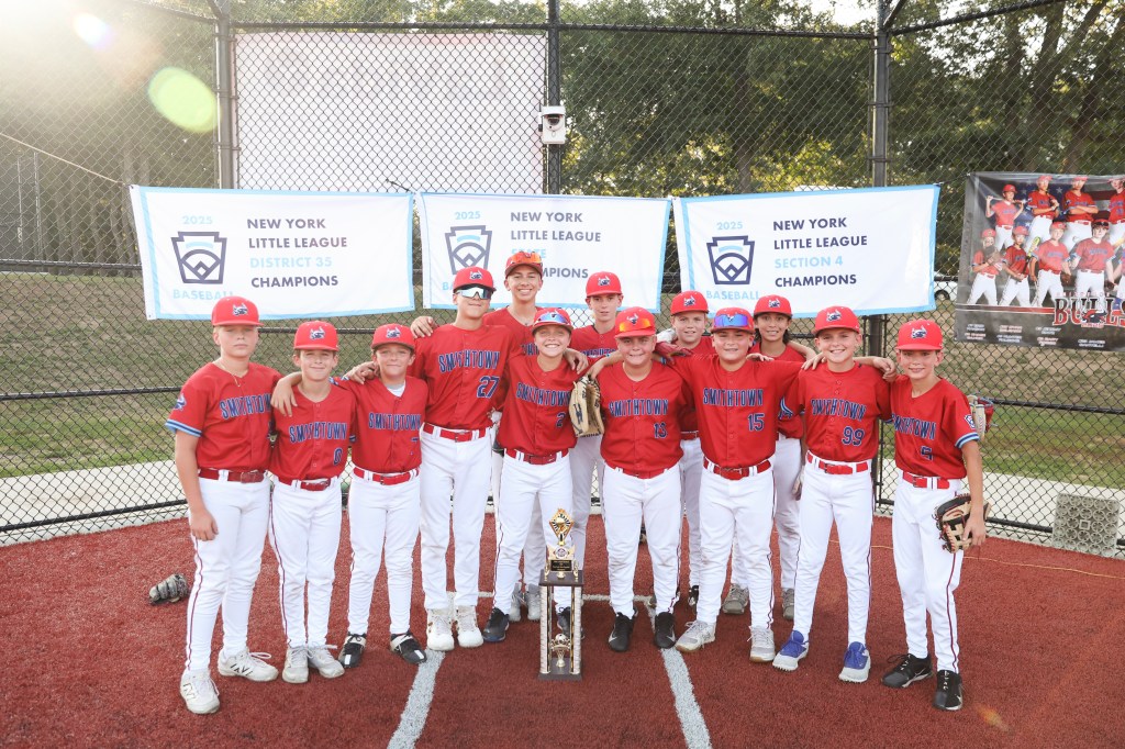 The St. James-Smithtown Little League team poses for a photo during practice in St. James, N.Y. on Monday, July 28, 2025. The team recently won the New York State title and are now playing for a chance to go to Williamsport. 